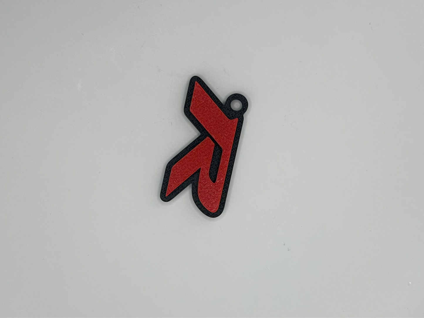 Llavero con la letra “R” de Type R