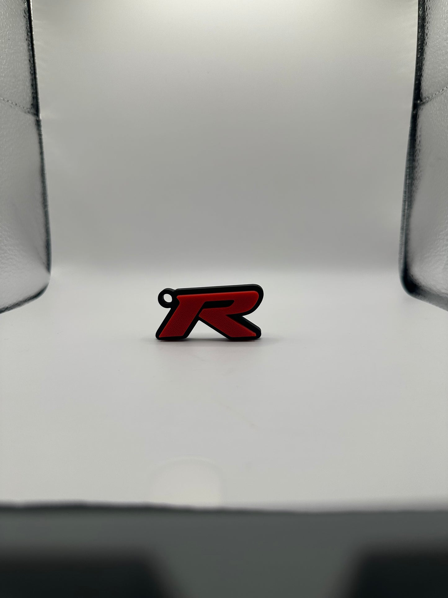 Llavero con la letra “R” de Type R