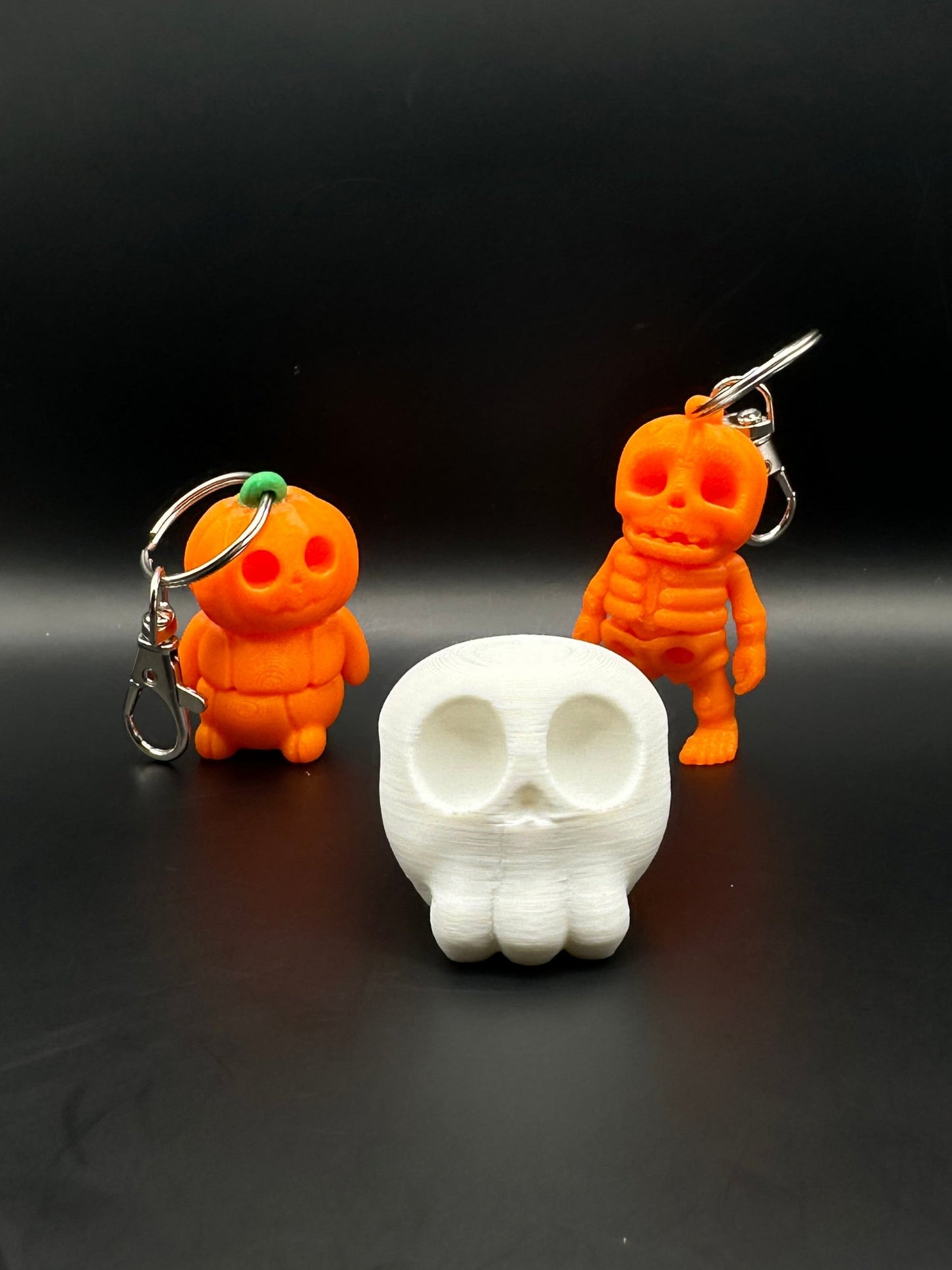 Llavero articulado con esqueleto de calabaza